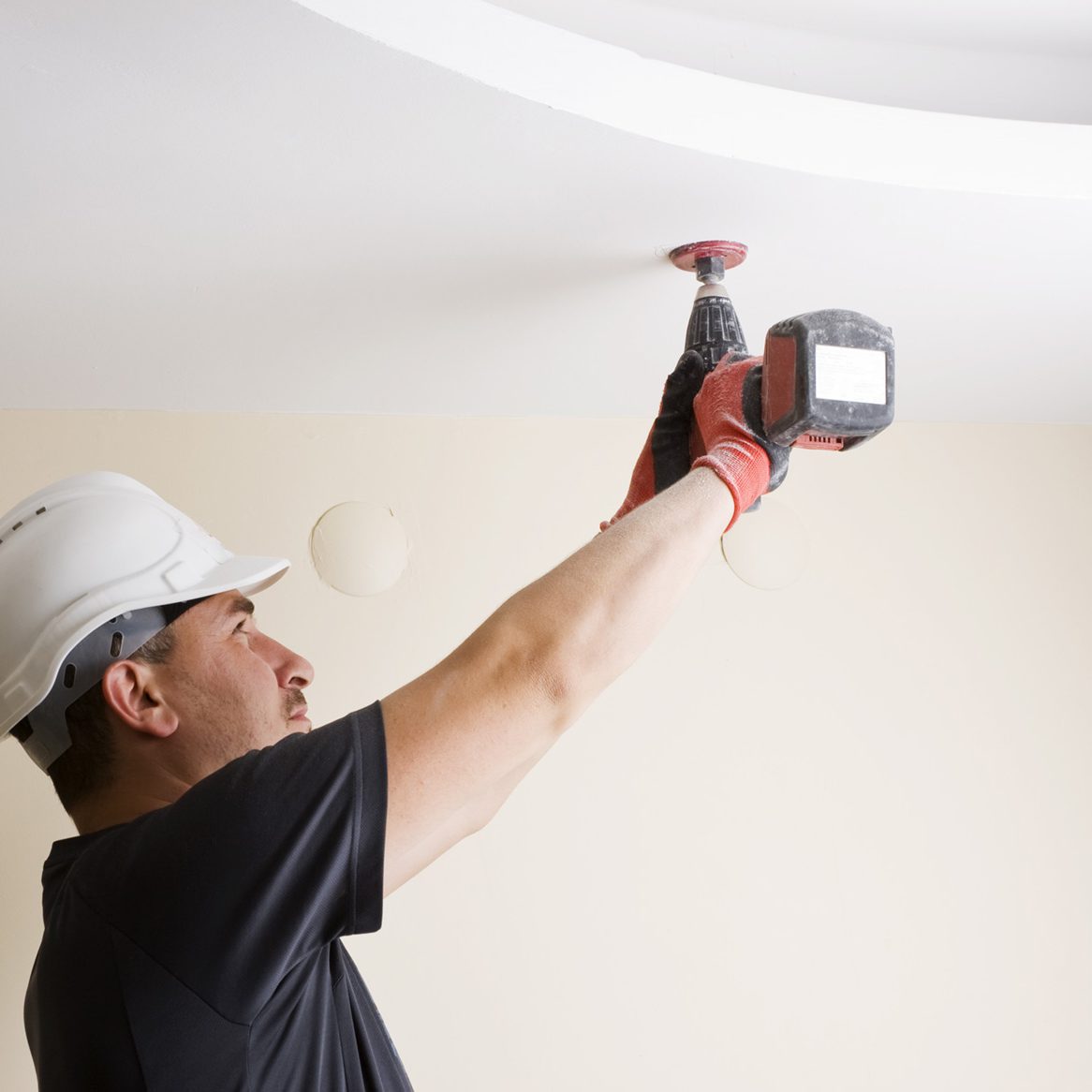 tradie-drilling-ceiling
