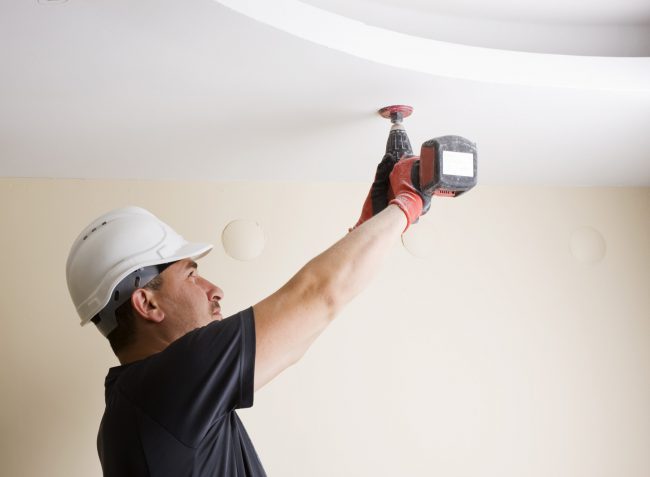 tradie-drilling-ceiling